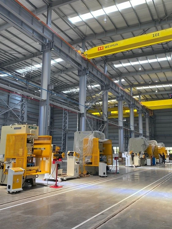 Goanwin press equipment across a large manufacturing floor
